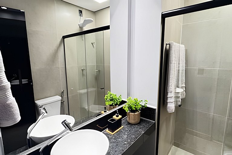 Studio moderno com duas camas de solteiro